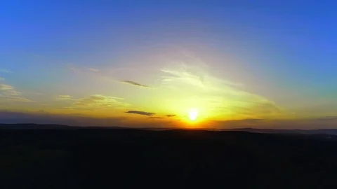 Aerial 4K view: Flight over the beautiful landscape and green wood. Stock Footage 115325329