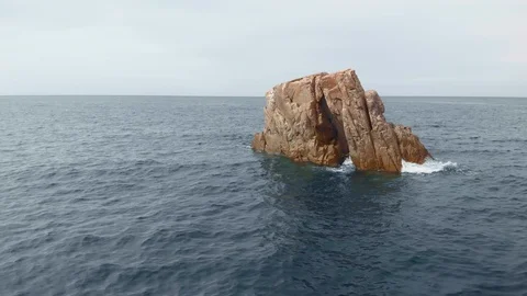 Aerial 4k view of large remote sea stack Stock Footage 119433535