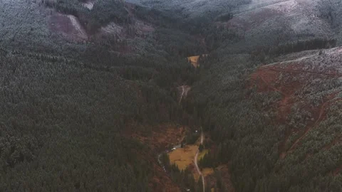 Aerial 4k view of mountains capped by first snow. Winter season is coming Stock Footage 141454623