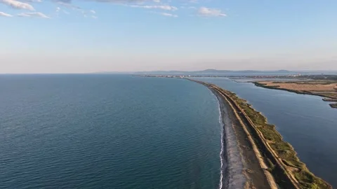 Aerial 4K View of Pomorie Sand Spit and Salt Lagoon Separated from the Black Sea Video stock 342014796
