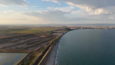 Aerial 4K View of Salt Evaporation Pans and Black Sea Shoreline near Pomorie 動画素材 342017196