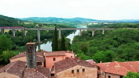 Aerial 4k view Train Freccia Rossa ETR 1000-Trenitalia-Passes by Rail bridge 스톡 동영상 196782622