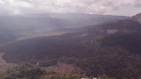 Aerial 4K view of volcano Mount Batur, Abang, Lake Batur in Kintamani, Bali Stock Footage 325387798
