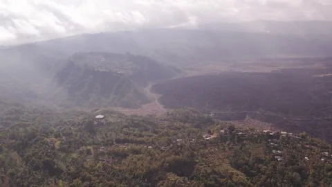 Aerial 4K view of volcano Mount Batur, Abang, Lake Batur in Kintamani, Bali Stock Footage 325387833
