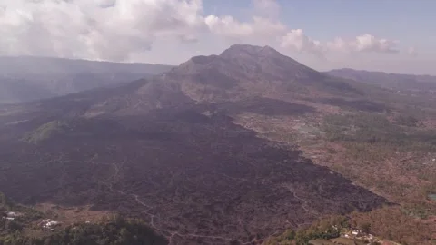 Aerial 4K view of volcano Mount Batur, Abang, Lake Batur in Kintamani, Bali Stock Footage 325387836