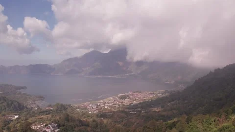Aerial 4K view of volcano Mount Batur, Abang, Lake Batur in Kintamani, Bali Stock Footage 325388103