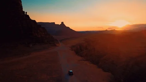 Aerial - 4x4 Driving Off-Road in Moab Utah at Sunrise Stock Footage 91188853