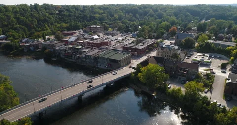 Aerial Above Nice River In A Small Town Valley Across The Bridge Into The Town Stock-Footage 200834194