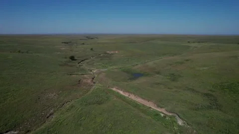 Aerial above the pristine prairies of eastern Kansas Stock Footage 319659578
