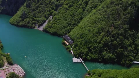 Aerial above Riverside accommodation on Komani lake in Albania 库存影片 339950014