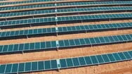 Aerial Above Rows Of Solar Panels Stock Footage