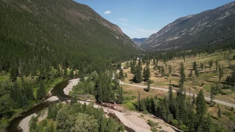 Aerial of Absaroka Mountain Range and Boulder River in Montana in summer Stock Footage 282915714