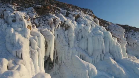 Aerial abstract giant epic ice surges at mountain foothills, enormous icicles Stock Footage 317963411