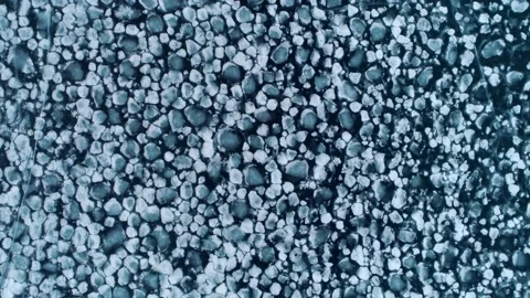 Aerial abstract pattern ice floe melting float on sea lake Block of ice. Arctic  Video stock 202642573