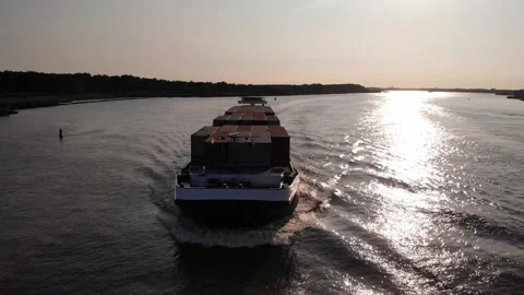 Aerial Across Bow Of Cargo Ship Devotion Going Past On Oude Maas Near Stock-Footage 158284817