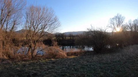 AERIAL Across the river towards the sunset Stock Footage 101074480