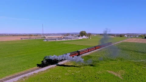 Aerial Ahead and Parallel View of a Single Rail Road Track With a Steam Tra.. Stock-Footage 230115014