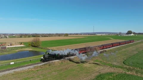Aerial Ahead and Parallel View of a Single Rail Road Track With a Steam Tra.. Stock-Footage 232909103