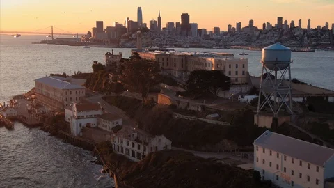 Aerial: Alcatraz island prison at sunrise, San Francisco, USA Stock Footage