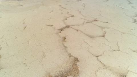 Aerial alien salt bed crystals surface slime pattern crust brine shallow lake    스톡 동영상 119412644
