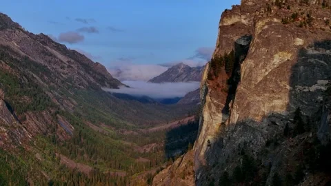 Aerial Along Massive Granite Wall Blodgett Canyon Stock Footage 331758641