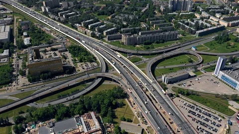 AERIAL. Amazing topview of two-level road junction in Russia. Day traffic of Stock Footage 108970554