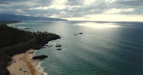 Aerial of amazing view of beach with cloud light beams Stock Footage 258964992