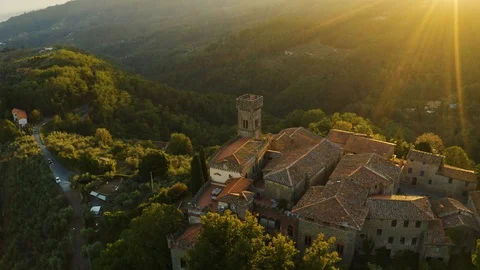 Aerial, an ancient small perched hamlet on sunset in Tuscany, Italy Video stock 100704416