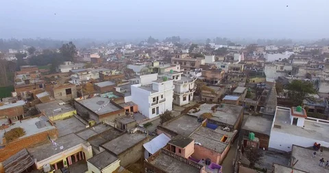 Aerial and camera shots  of people in slum houses . Stock Footage