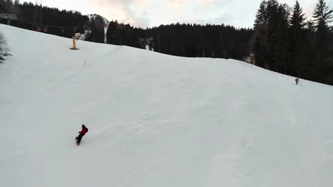 Aerial and drone view of Bad Hofgastein ski slope with snowboarders and ski.. Video stock 265026432