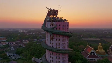 Aerial angle of dragon temple standing against a golden sky, Thailand Stock-Footage 304374215