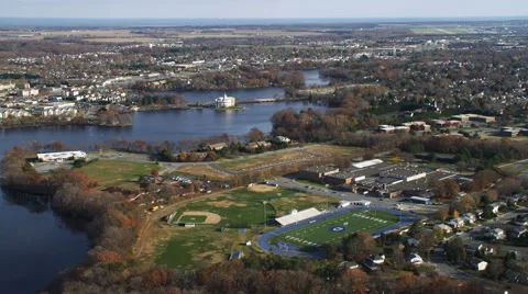 Aerial approach to Dover, DE over Silver Lake. Shot in 2011. Stock Footage 59527977