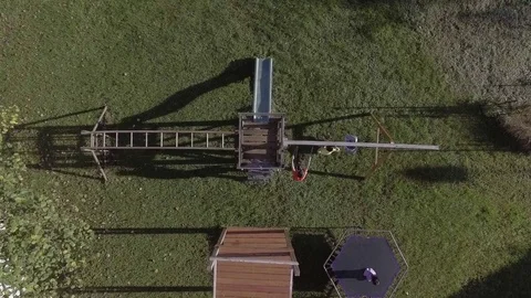 Aerial approach to ground view of children playing Video stock 81551905