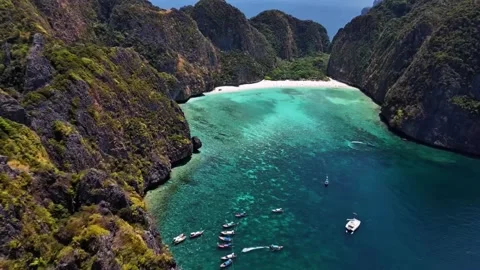 Aerial Approach Over Maya Bay White Beach and Limestone Cliffs Stock Footage 341008293