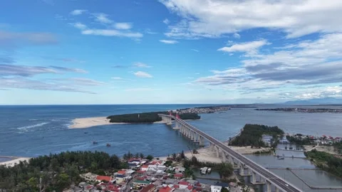 Aerial approach to Thuan An cable-stayed bridge 4K Stock Footage 339860542