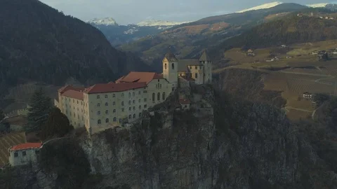 Aerial approaching castle / monastery perched on the top of a rocky mountain in 스톡 동영상 129839939