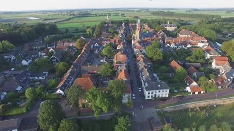 Aerial approaching church in beautiful walled city,Buren,Netherlands Stock Footage
