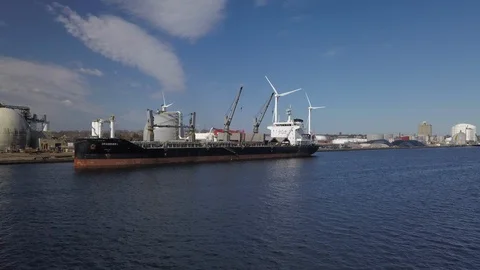 Aerial approaching container vessel ship in port Stock Footage 129451392