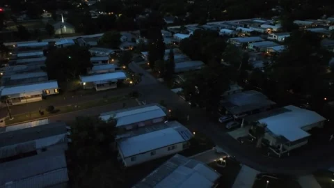 Aerial approaching flight over lighting lantern on streets of cheap and Stock Footage 313025758