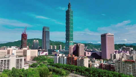 Aerial approaching shot of 101 Tower in City of Taipei during sunny day Stock Footage 244727040