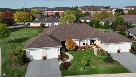 Aerial approaching shot of semi-detached buildings with pathway and double Stock Footage 320163088