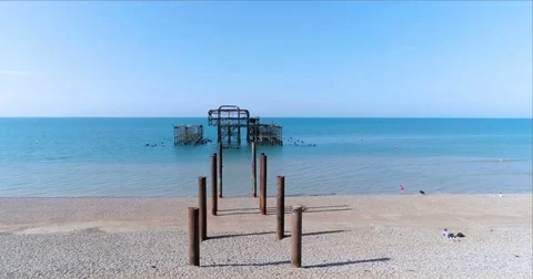 Aerial approaching view of the destroyed West Pier in Brighton Stock Footage