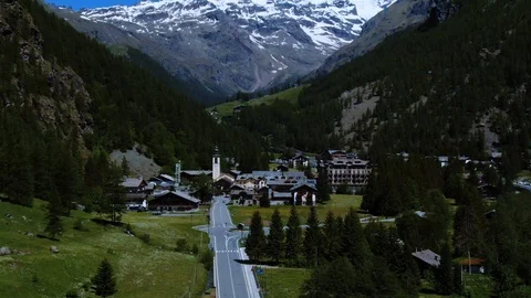 Aerial approaching view of Gressoney la Trinite in the Italian Alps Stock Footage 111860913