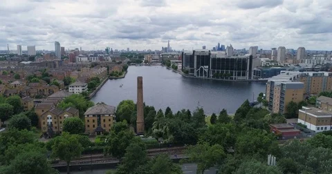Aerial approaching view of the Millwall outer dock in London Stock Footage 77343701