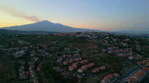 Aerial approaching view of Mount Etna in Sicily after sunset Stock Footage 306240946