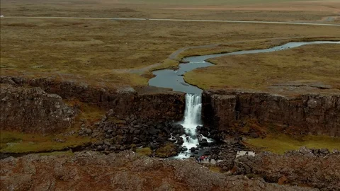 Aerial approaching view of Oxararfoss waterfall in Iceland Stock Footage 117348534