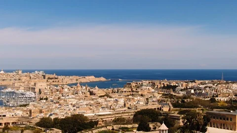 Aerial approaching view of the towns of Vittoriosa and Valletta in Malta Stock Footage 106915637