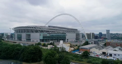 Aerial approaching view of Wembley stadium in North London Stock Footage
