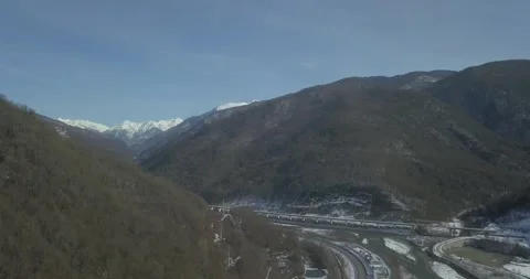 Aerial around cable-stayed bridge Adler road Krasnaya polyana Sochi Russia Stock Footage 289650231