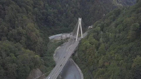 Aerial around cable-stayed bridge Adler road Krasnaya polyana Sochi Russia Stock Footage 289650964